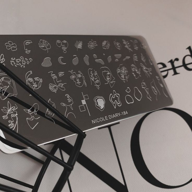 STAMPING ABSTRACT FACES - 184