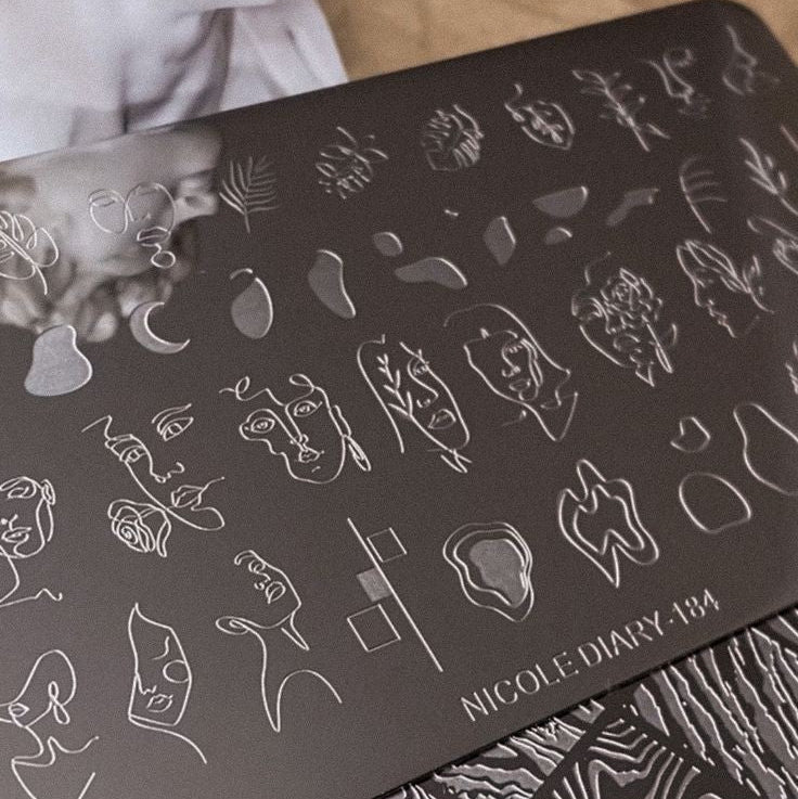 STAMPING ABSTRACT FACES - 184